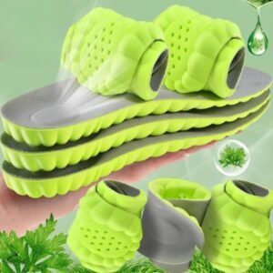Semelles orthopédiques pour le sport vertes et respirantes sur fond vert
